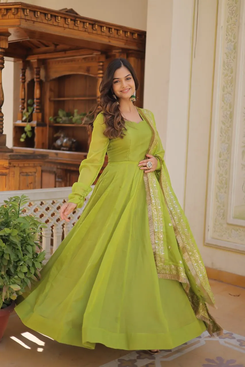 Enchanting Parrot Green Russian Silk Gown-Dupatta Set with Exquisite Sequined Embroidery and Lace Border
