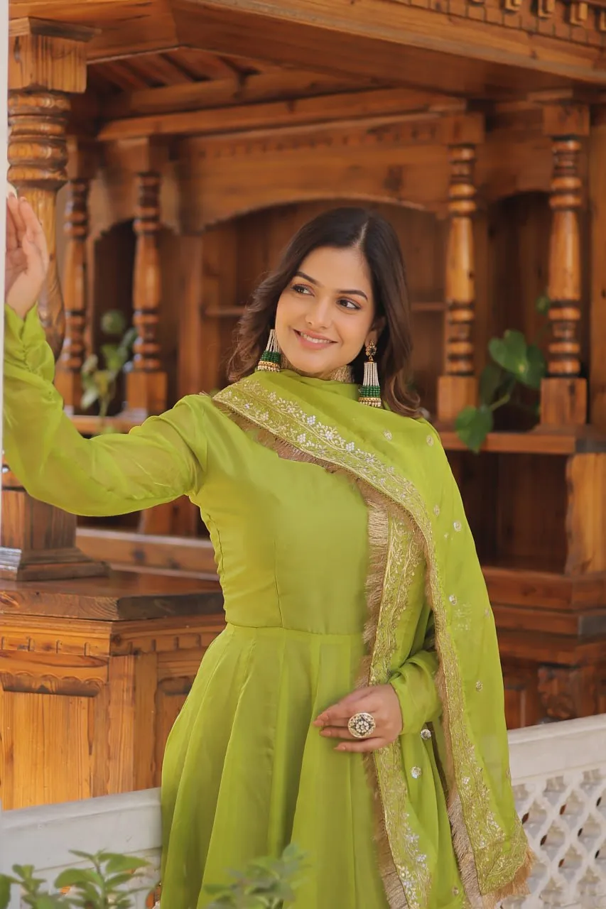 Enchanting Parrot Green Russian Silk Gown-Dupatta Set with Exquisite Sequined Embroidery and Lace Border