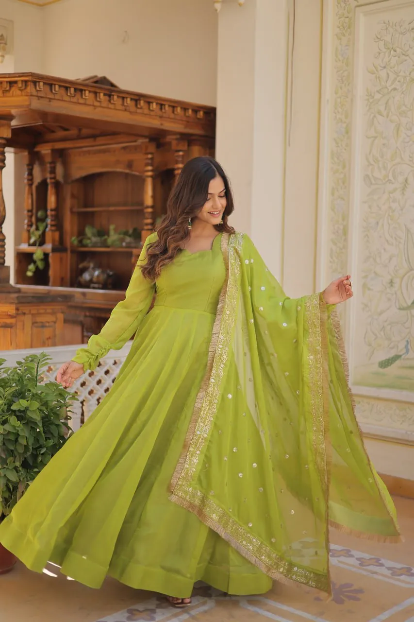 Enchanting Parrot Green Russian Silk Gown-Dupatta Set with Exquisite Sequined Embroidery and Lace Border