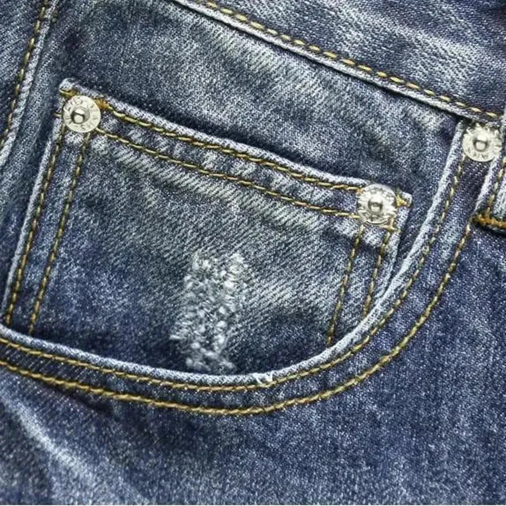 Medium-wash men's loose jeans