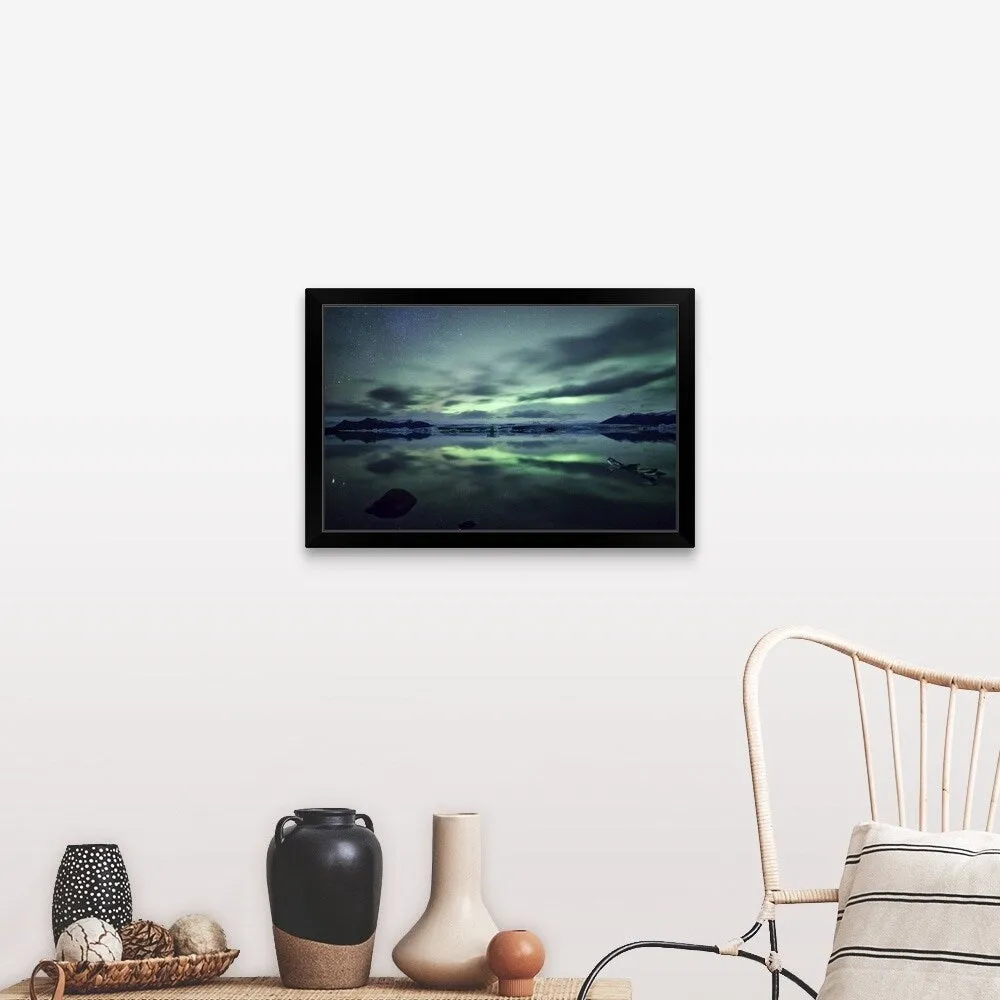 "Aurora borealis over Jokulsarlon glacial lagoon in south Iceland." Black Framed Print